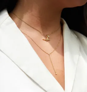 To effectively optimize the e-commerce product title for searchability and appeal, we can include key details and modifiers that describe the item accurately. Here is a revised version:

Kaeli Mae x RELLERY Elegant Gold-Plated Necklace with Unique Pendant Design

This title includes the brand collaboration, a descriptive adjective (elegant), the material (gold-plated), the product type (necklace), and a feature (unique pendant design).